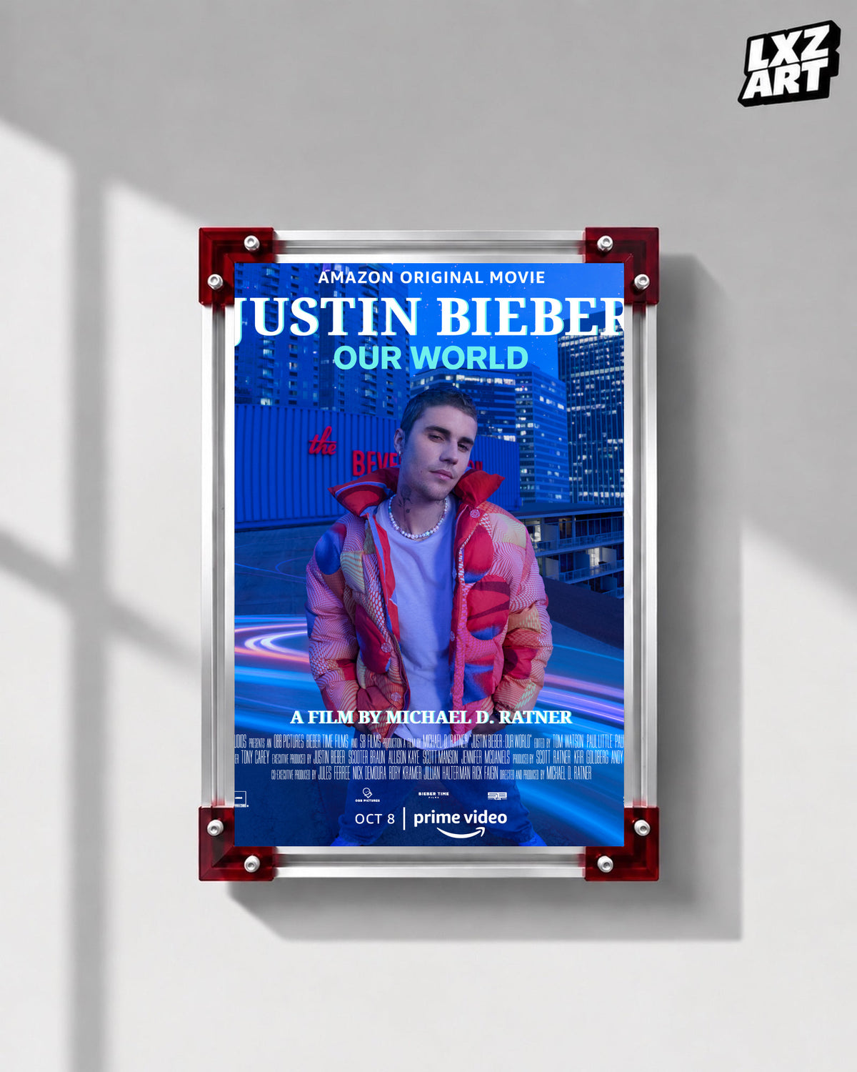 Justin Bieber Our World Blue City Concert Documentary Poster displayed on a gray wall in a red corner frame; unframed print, frame not included