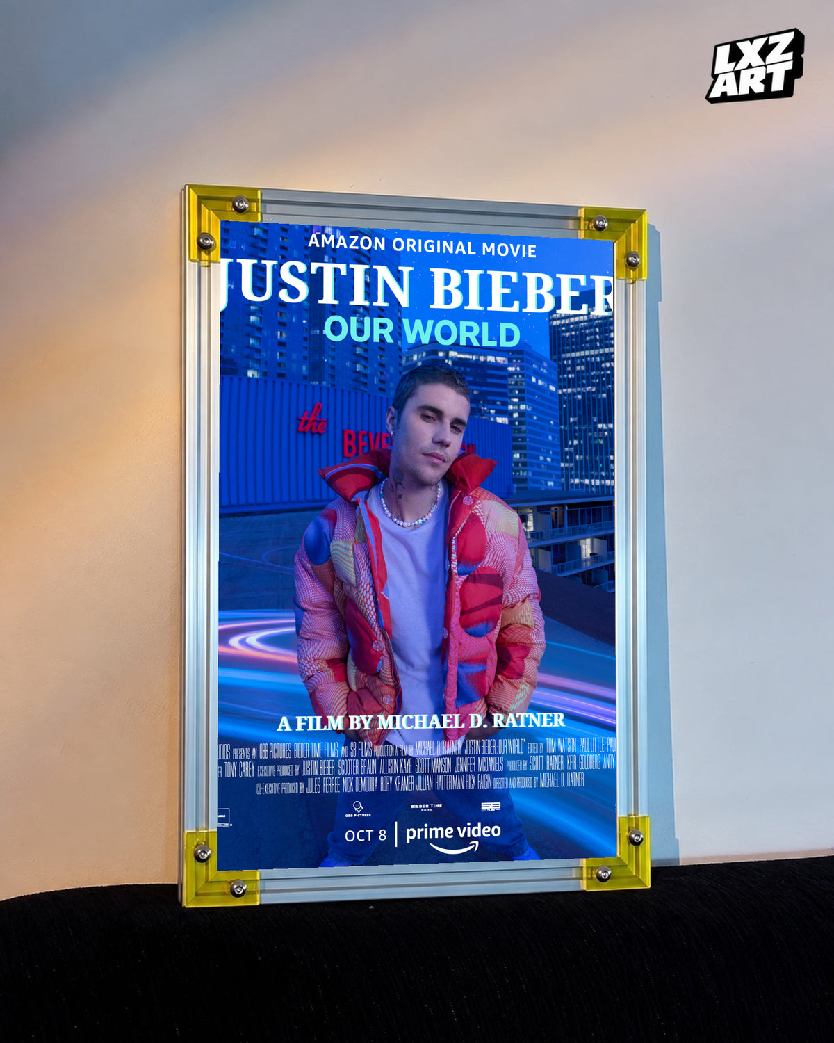 Justin Bieber Our World Blue City Concert Documentary Poster displayed on a warm wall in a yellow corner frame; unframed print, frame not included