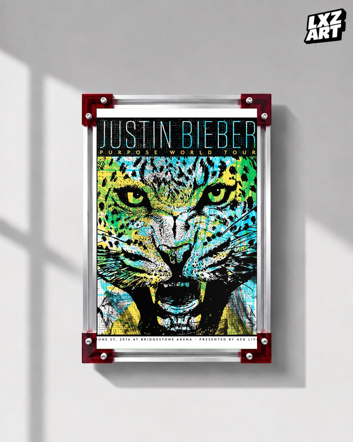 Justin Bieber Purpose World Tour Nashville Jaguar Poster displayed on a gray wall in a red corner frame; unframed print, frame not included