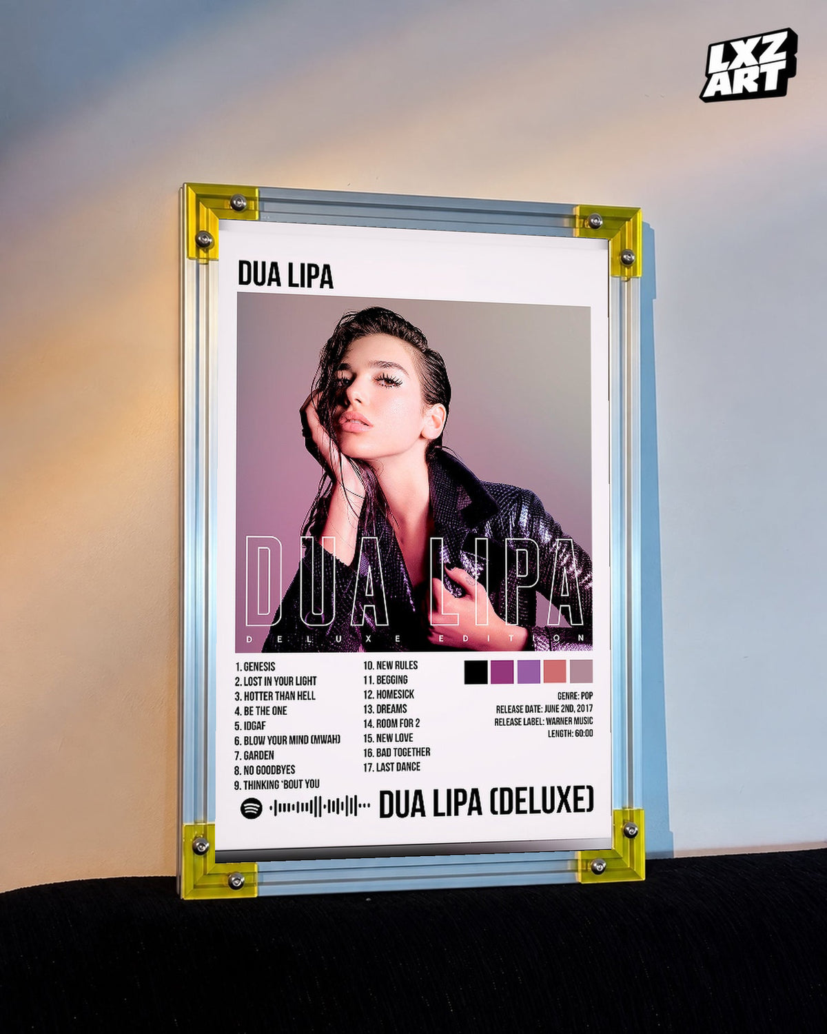 Dua Lipa Deluxe Purple Portrait Tracklist Poster displayed on a warm wall in a yellow corner frame; unframed print, frame not included