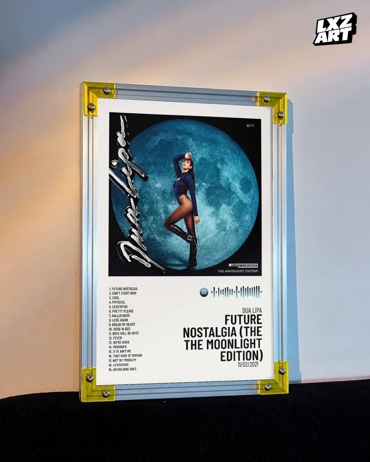 Dua Lipa Future Nostalgia Moonlight Edition Tracklist Poster displayed on a warm wall in a yellow corner frame; unframed print, frame not included