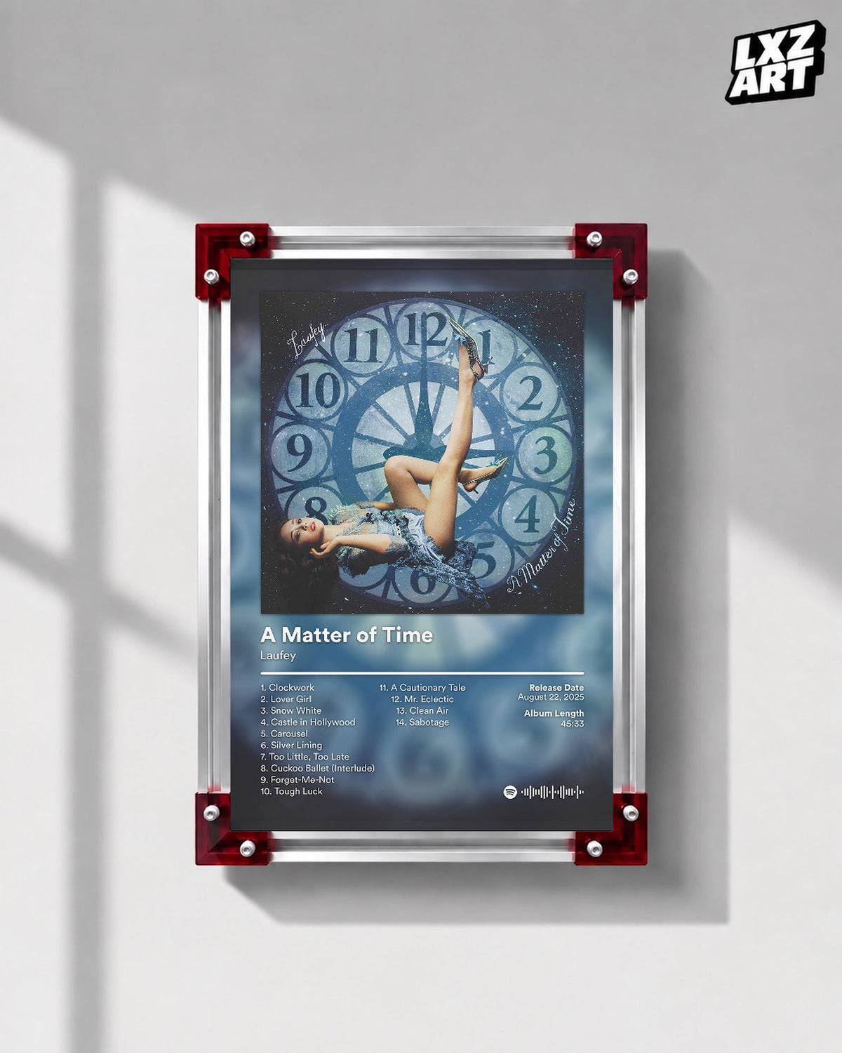 Laufey A Matter of Time Blue Clock Tracklist Poster displayed on a gray wall in a red corner frame; unframed print, frame not included