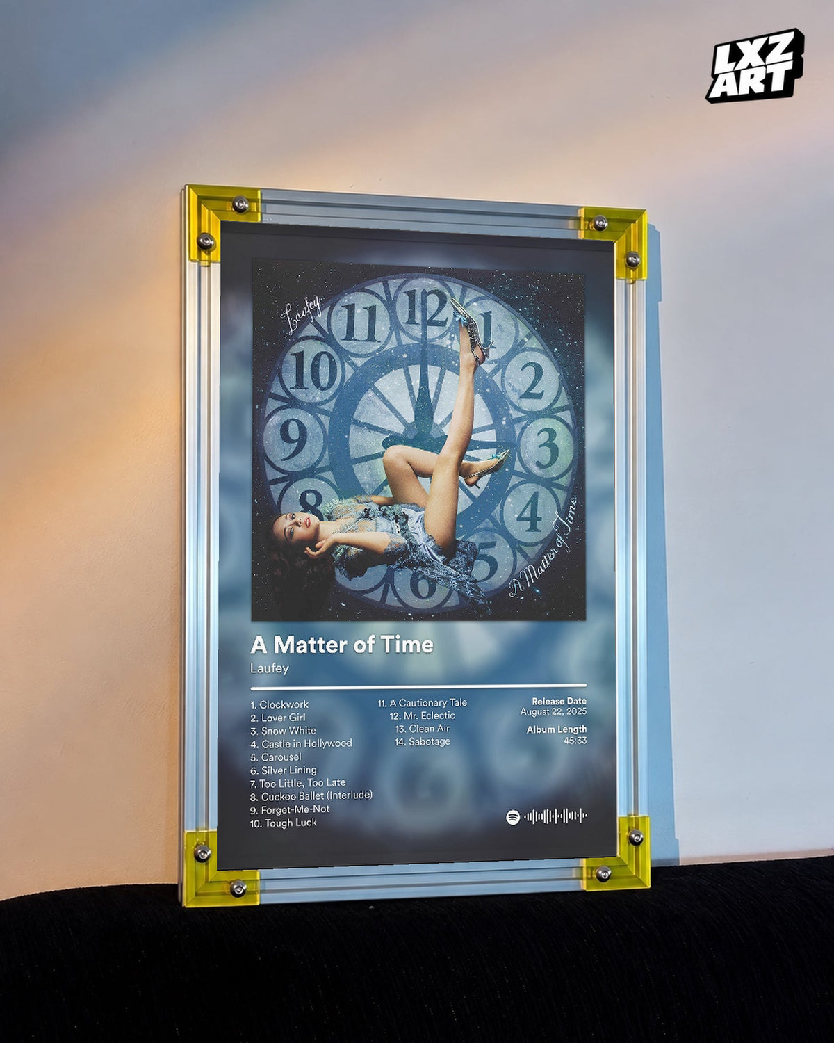 Laufey A Matter of Time Blue Clock Tracklist Poster displayed on a warm wall in a yellow corner frame; unframed print, frame not included