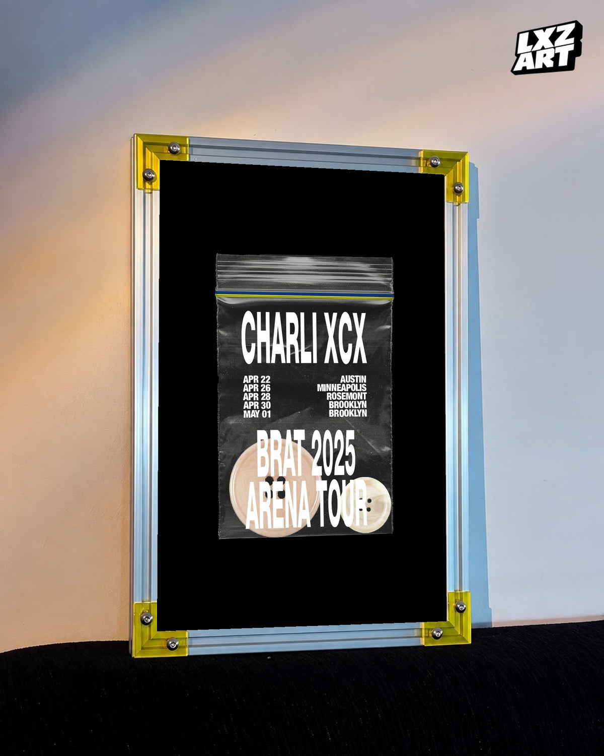 Charli xcx Brat 2025 US Tour Disc Graphic Poster displayed on a warm wall in a yellow corner frame; unframed print, frame not included