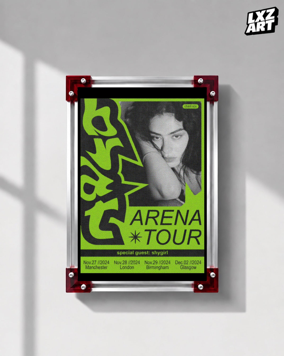 Charli xcx Brat Arena Tour Green Portrait Poster displayed on a gray wall in a red corner frame; unframed print, frame not included