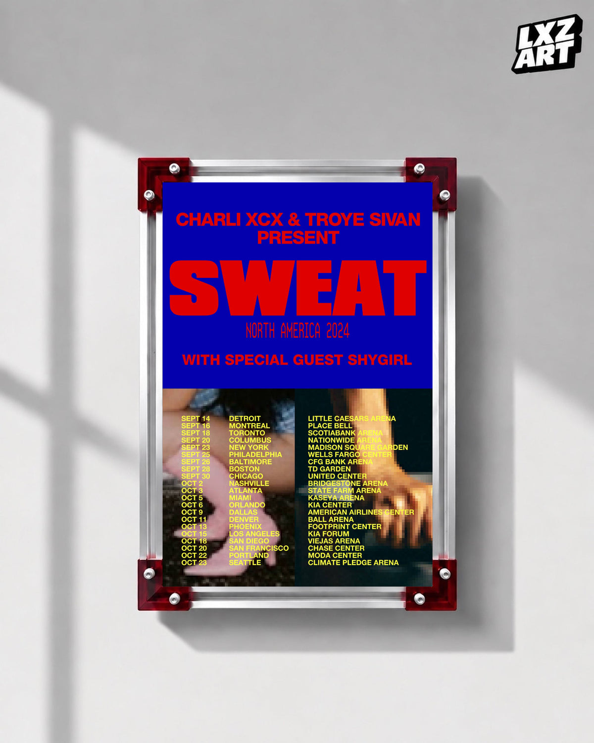 Charli xcx Sweat 2024 Blue and Red Tour Poster displayed on a gray wall in a red corner frame; unframed print, frame not included