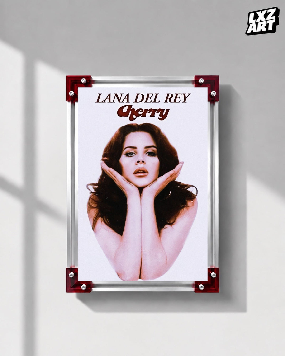 Lana Del Rey Cherry Portrait Song Poster displayed on a gray wall in a red corner frame; unframed print, frame not included