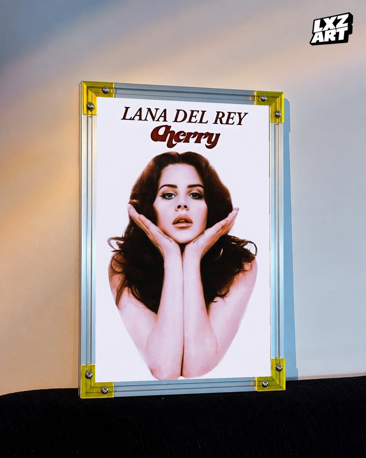 Lana Del Rey Cherry Portrait Song Poster displayed on a warm wall in a yellow corner frame; unframed print, frame not included
