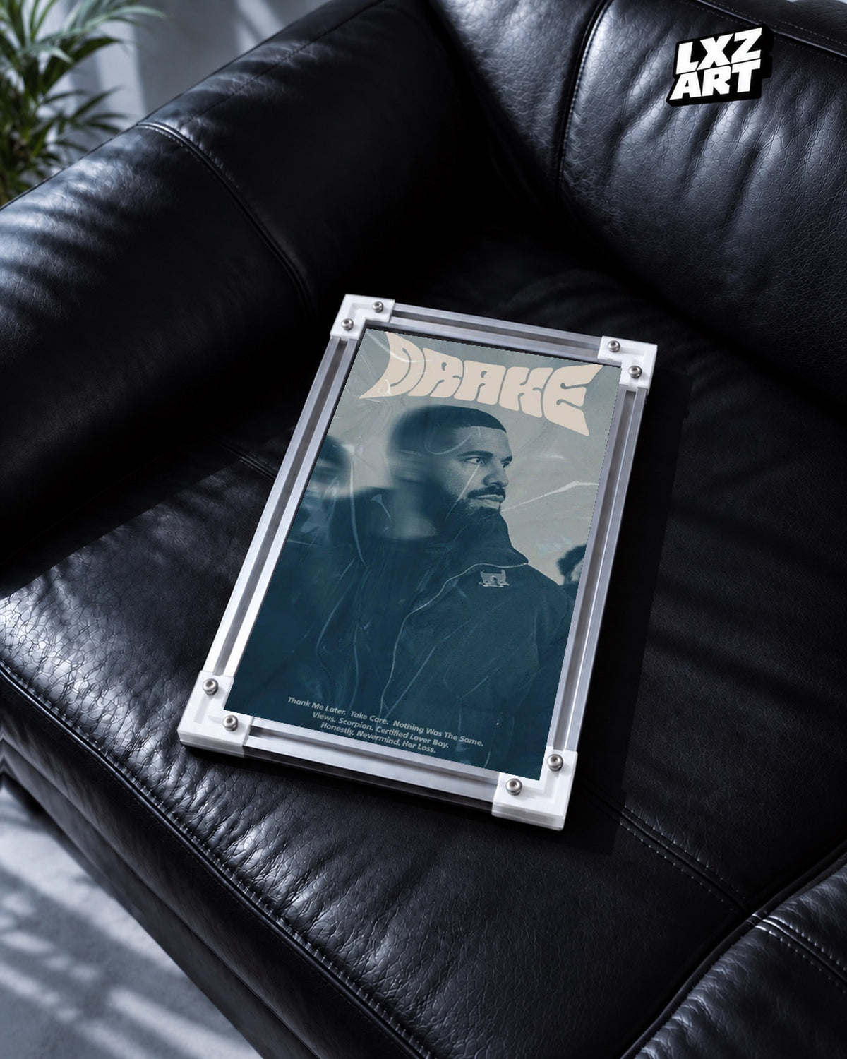 Drake Retro Typography Portrait Poster — black leather sofa; frame for display only