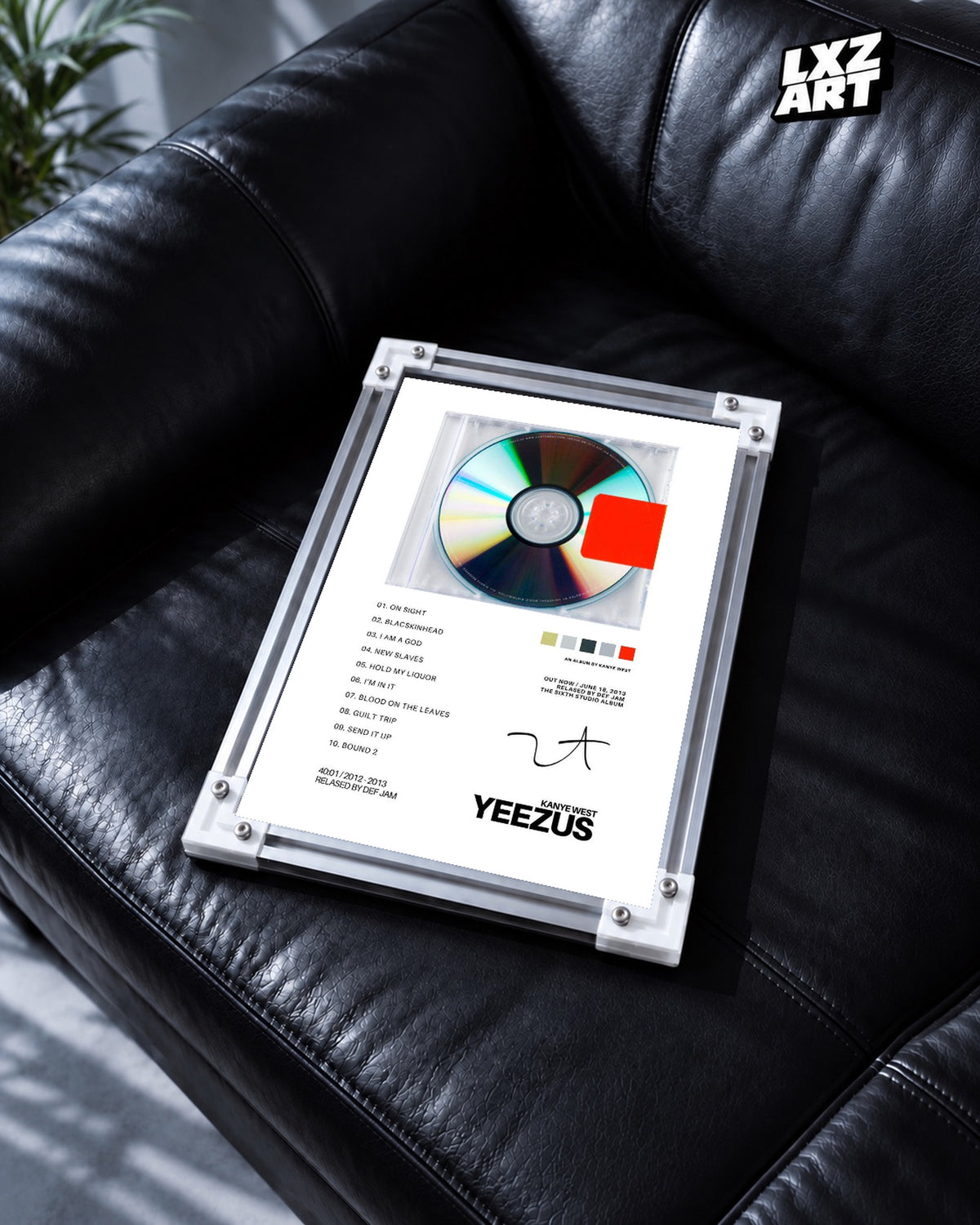 Kanye West Yeezus Album Tracklist Poster — black leather sofa; frame for display only