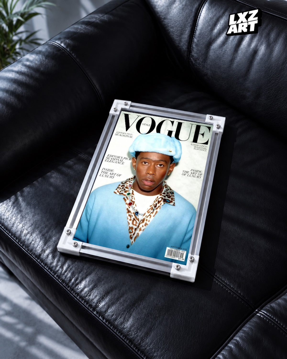 Tyler, The Creator Magazine Portrait Poster — black leather sofa; frame for display only