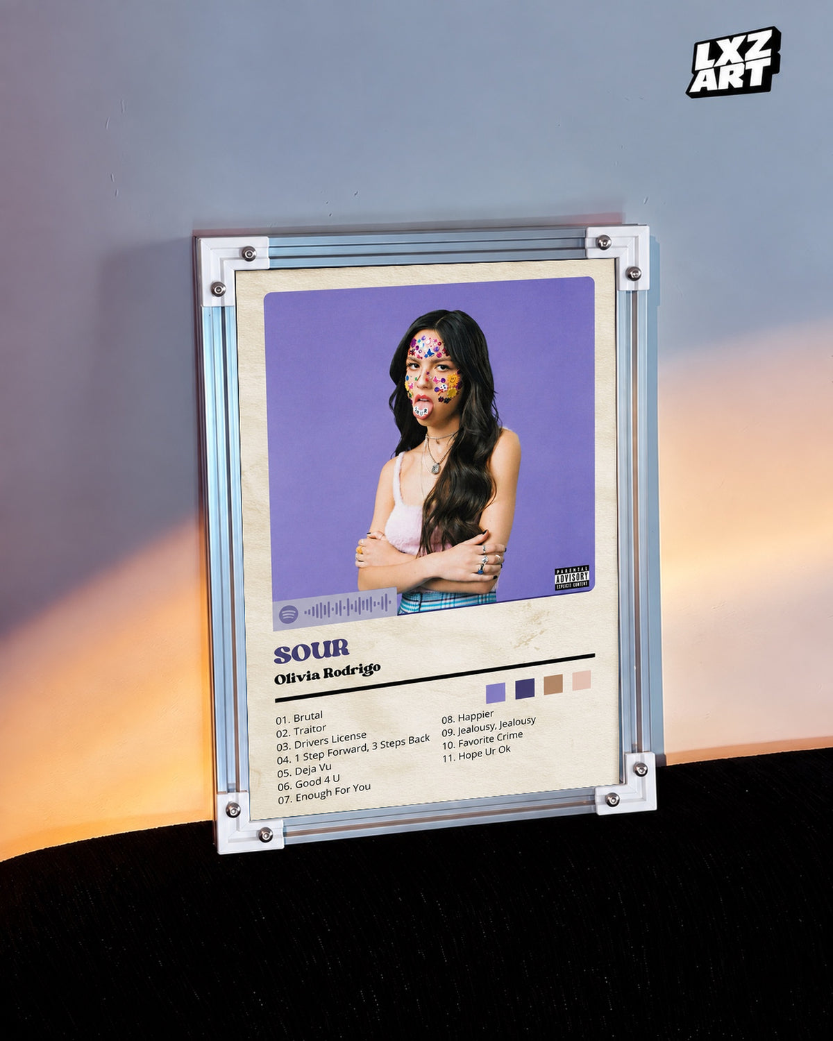 Olivia Rodrigo SOUR Purple Tracklist Poster — warm light wall; frame for display only