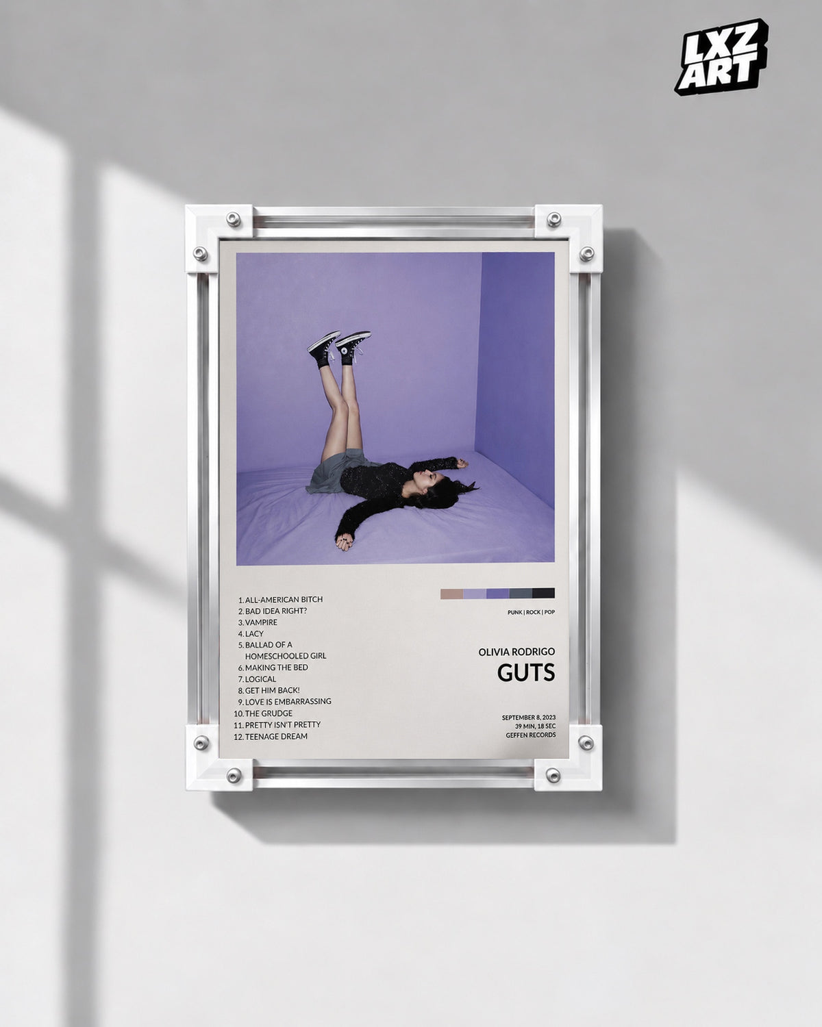 Olivia Rodrigo GUTS Tracklist Poster — gray wall front view; frame for display only