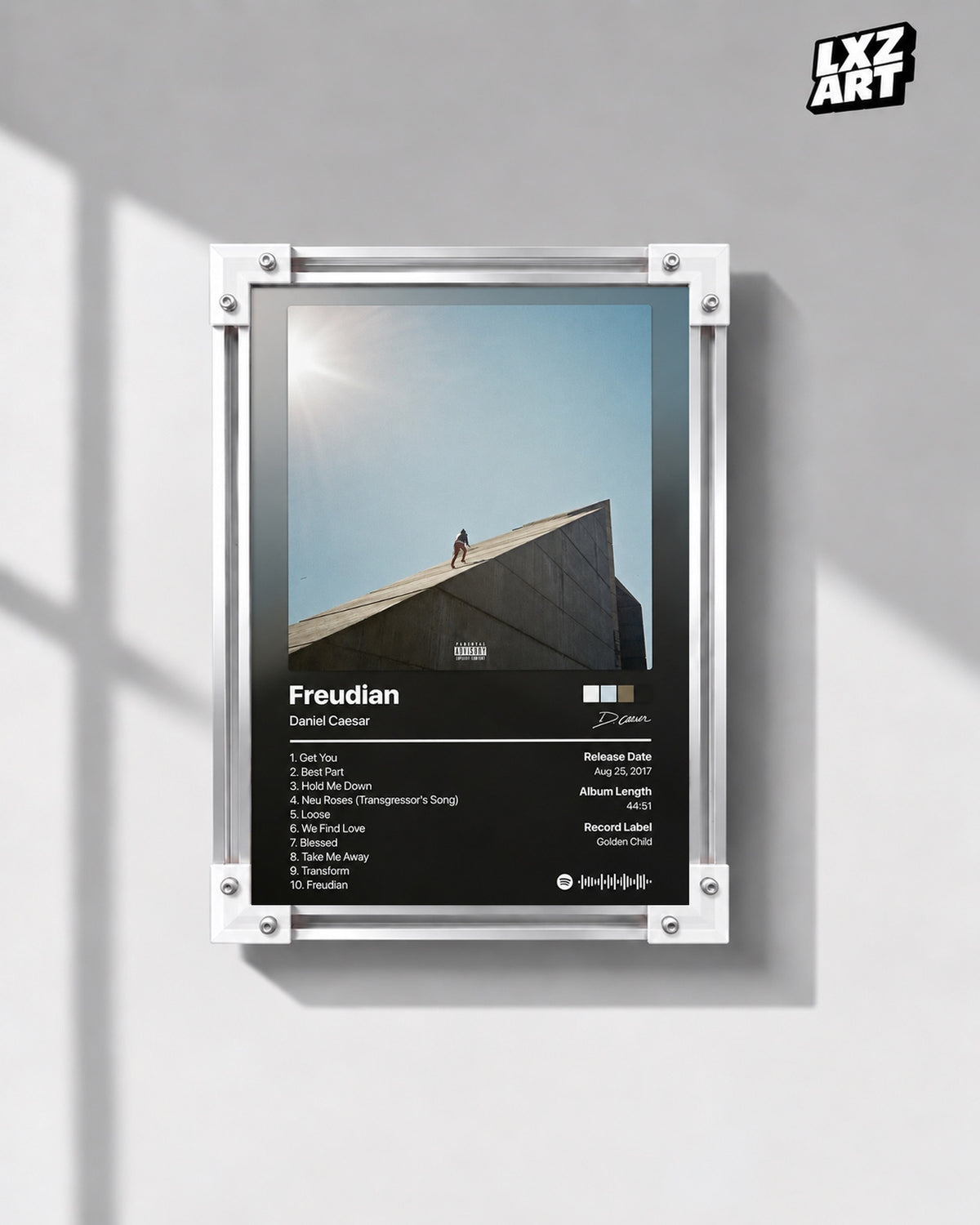 Daniel Caesar Freudian Tracklist Poster — gray wall front view; frame for display only
