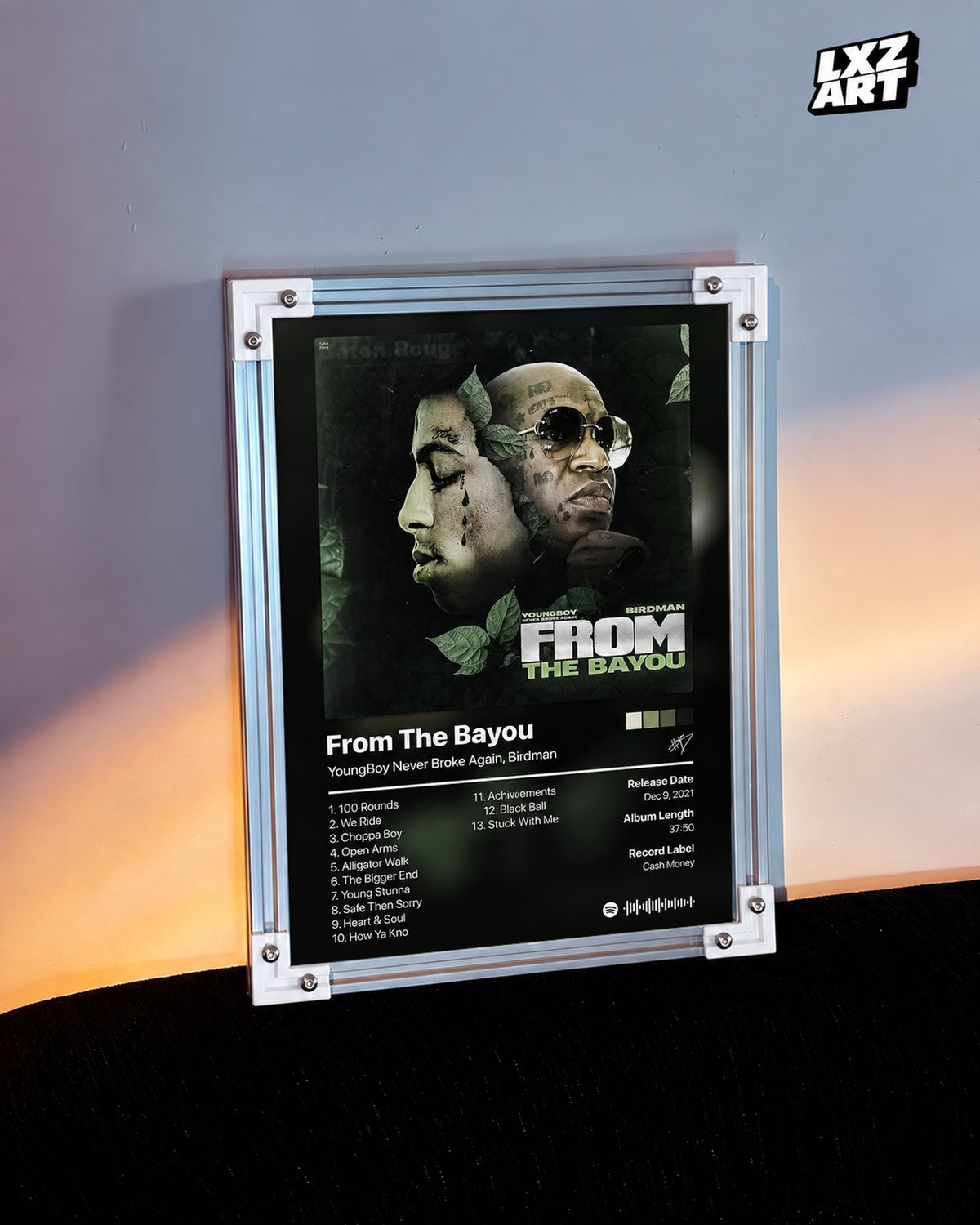 YoungBoy Never Broke Again & Birdman From The Bayou Tracklist Poster — warm light wall; frame for display only