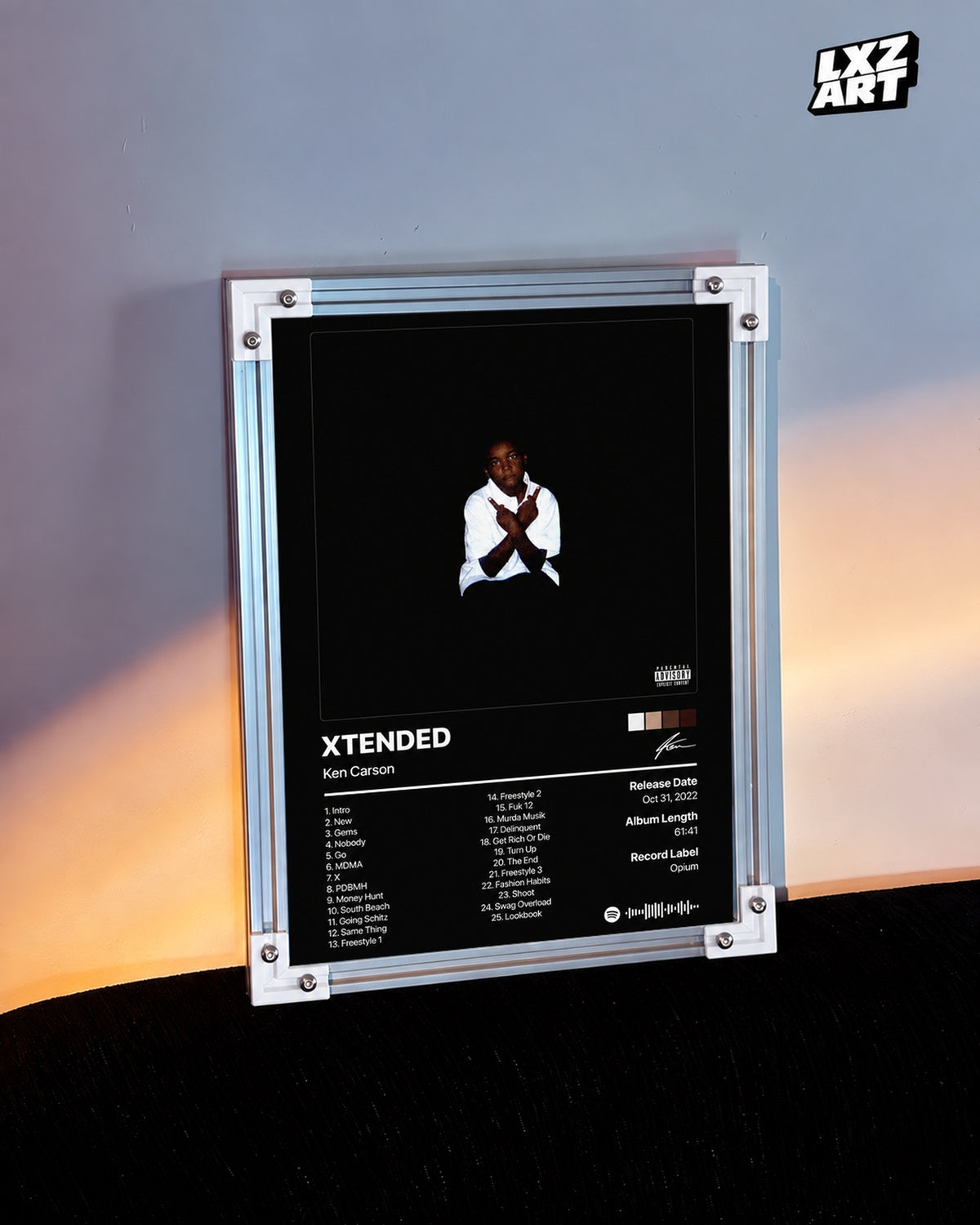 Ken Carson XTENDED Tracklist Poster — warm light wall; frame for display only