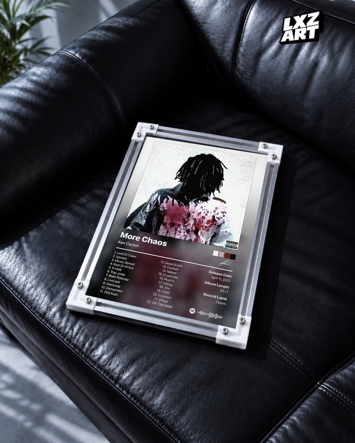 Ken Carson More Chaos Tracklist Poster — black leather sofa; frame for display only