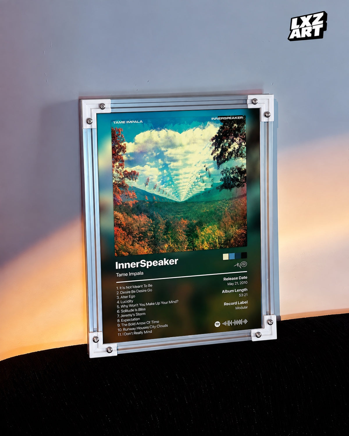 Tame Impala InnerSpeaker Tracklist Poster — warm light wall; frame for display only