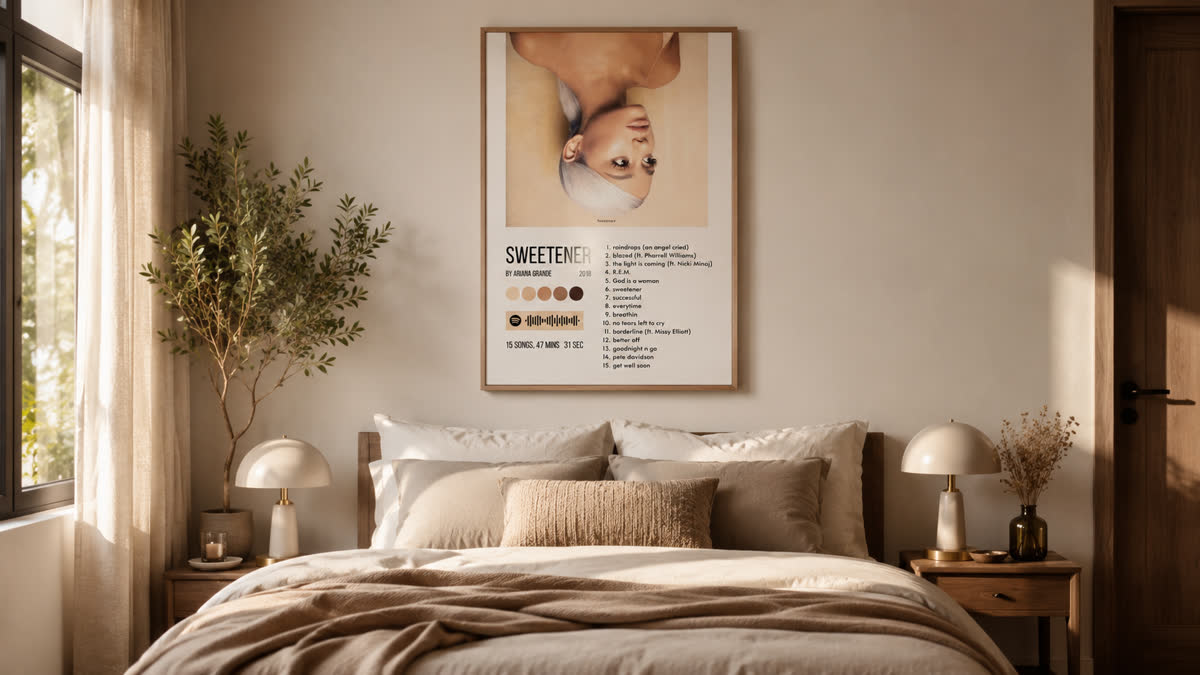 Music poster above a calm bedroom wall
